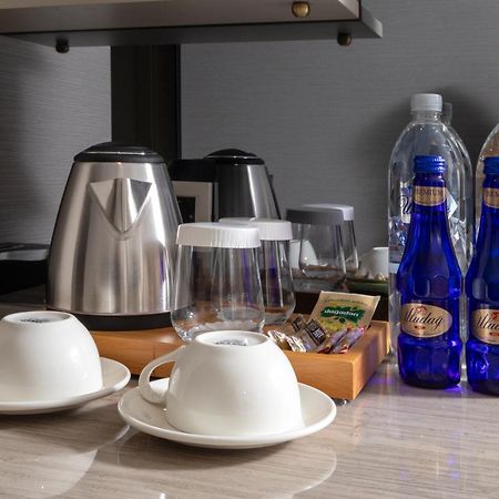 Bentley Hotel Old City-Special Class Стамбул Экстерьер фото Bottled water in a hotel room