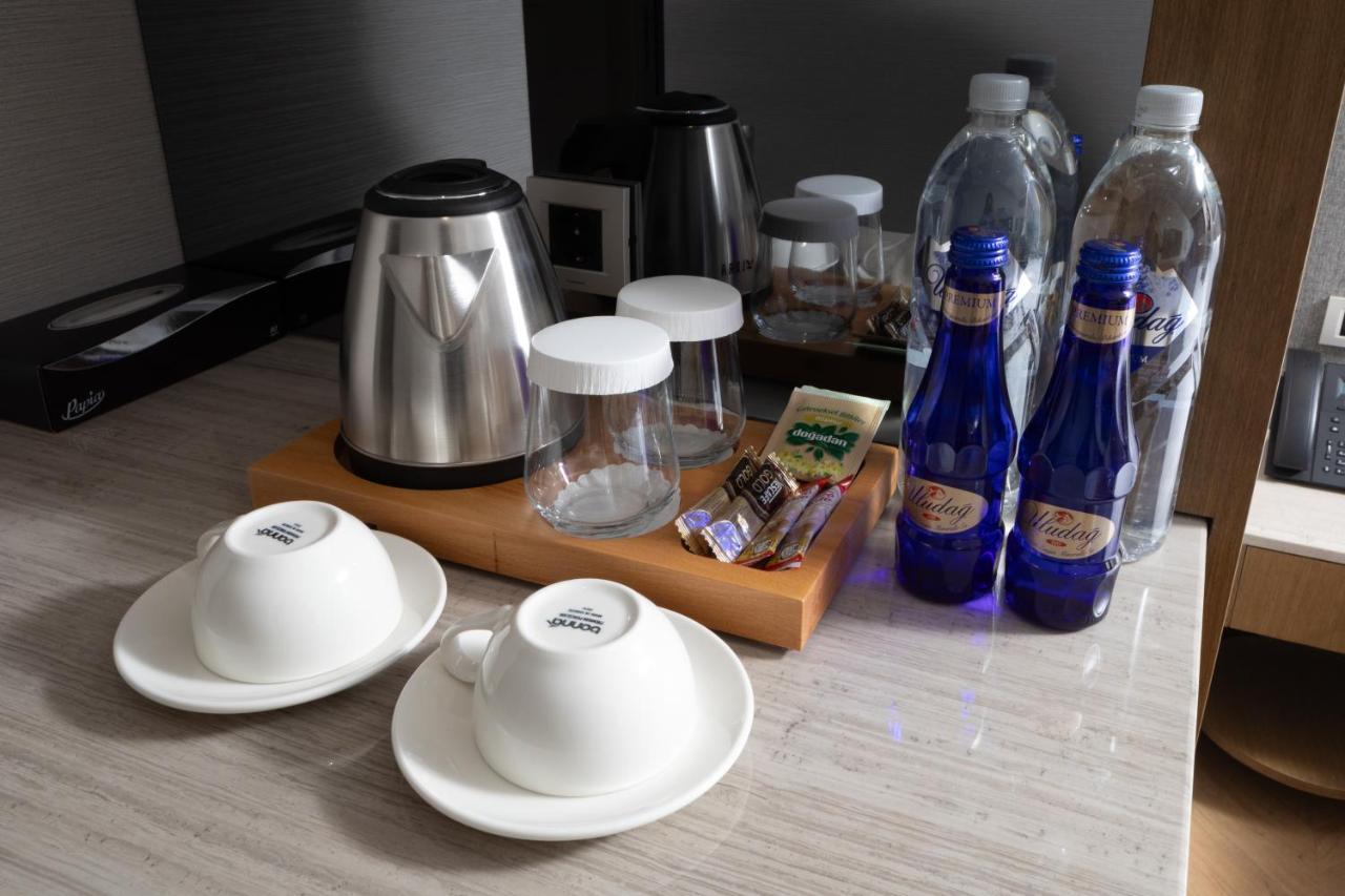 Bentley Hotel Old City-Special Class Стамбул Экстерьер фото Bottled water in a hotel room